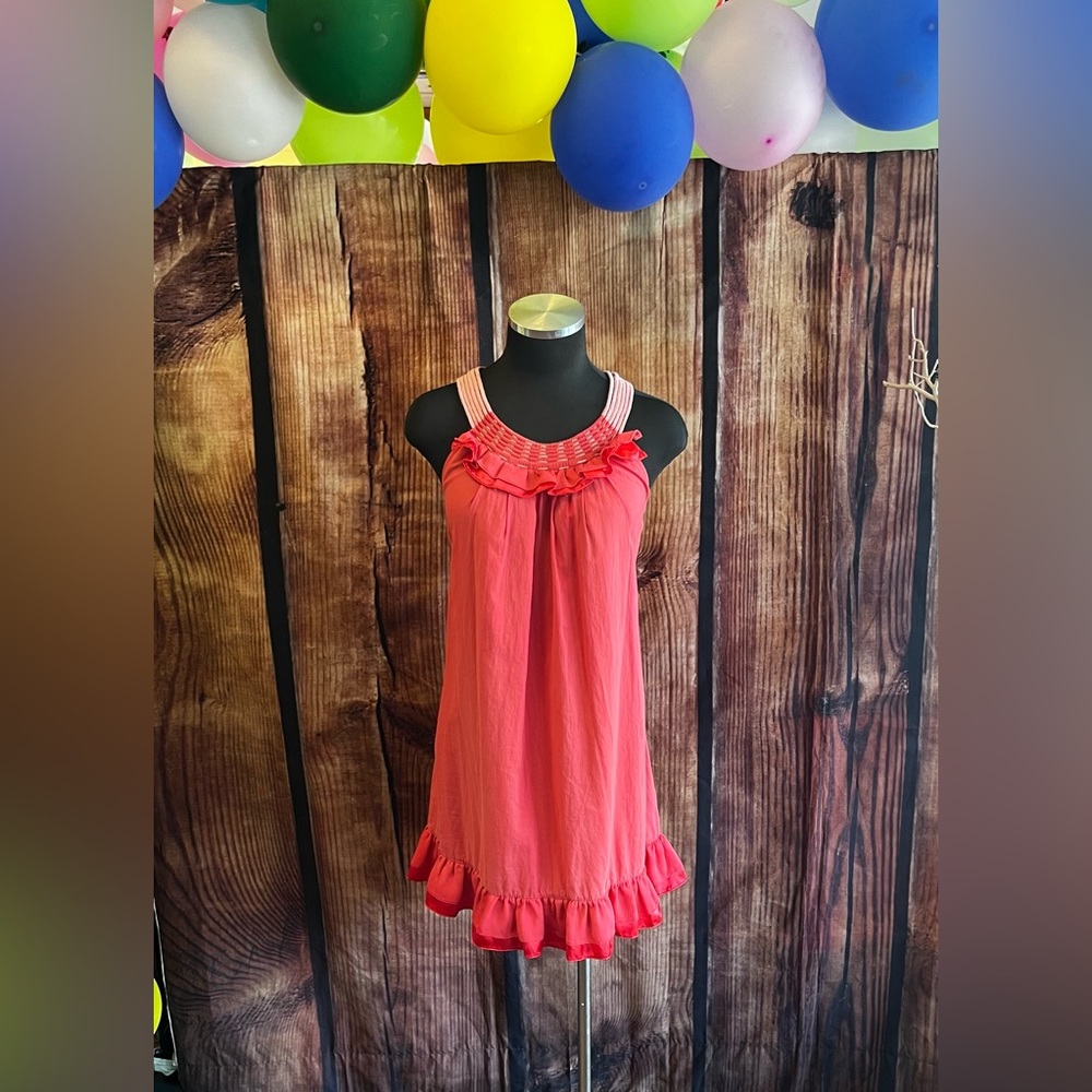 Peach mini dress with rope straps.